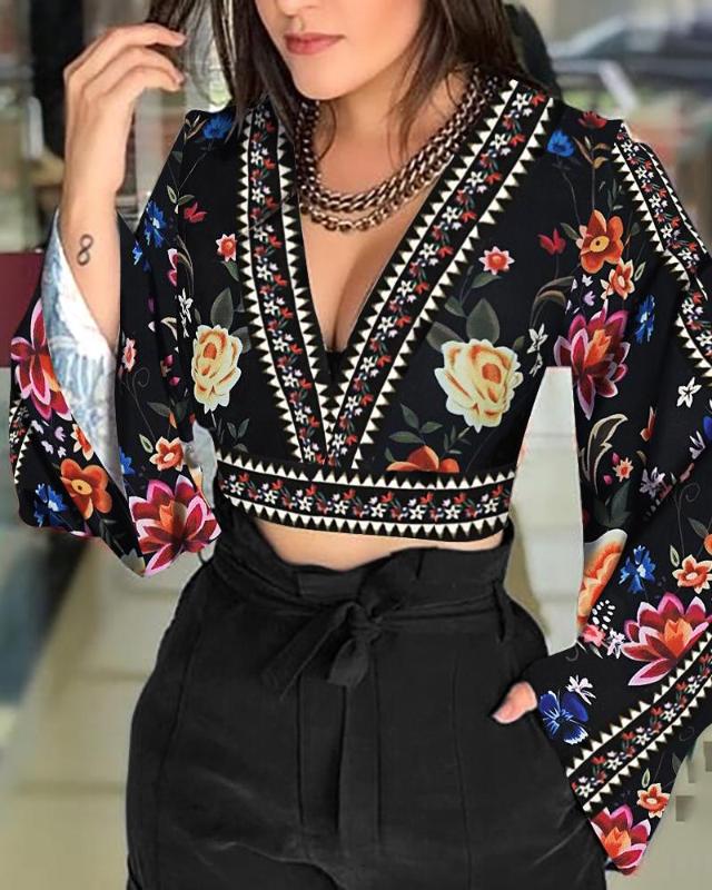 Sexy V-Neck Open Back Bell Sleeve Floral Printed Casual Blouse Women Long Sleeve Short Blouse Tops Streetwear
Sexy V-Neck Open Back Bell Sleeve Floral Printed Casual Blouse Women Long Sleeve Short Blouse Tops Streetwear