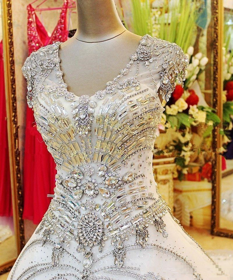 Luxury Sparkly Crystal Princess Wedding Dresses 2020 V-neck Cap Sleeve Chapel Train Rhinestone Beaded Church Garden Wedding Gown