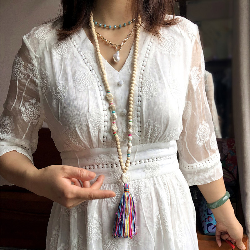 Bohemian ethnic style handmade geometric alien Pine stone string white wooden bead necklace colorful tassel long sweater chain female, Ivory
Bohemian ethnic style handmade geometric alien Pine stone string white wooden bead necklace colorful tassel long sweater chain female, Ivory