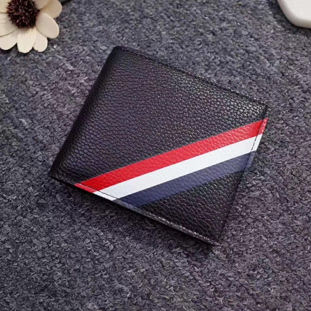Hot sell men Luxury European popular new fashion business wallet real Leather Men Wallet short billfol Genuine leather TB wallet with box, Red;black
Hot sell men Luxury European popular new fashion business wallet real Leather Men Wallet short billfol Genuine leather TB wallet with box, Red;black