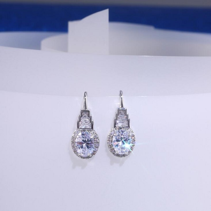 Top-Selg Vintage Jewelry: Oval Cut White Topaz Dangg Earrings in Sterg Sier for Women