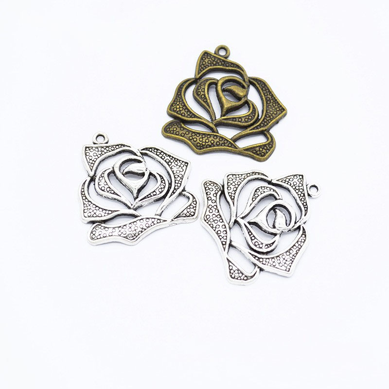 Bulk 200pcs hollowed out design 27x27mm rose flower charms pendant for love jewelry making DIY craft
Bulk 200pcs hollowed out design 27x27mm rose flower charms pendant for love jewelry making DIY craft