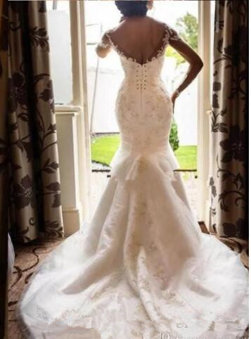 African Mermaid Wedding Dresses with Illusion Long Sleeve 2019 Jewel Neck Lace-up Trumpet Lace Beaded Garden Bridal Dress