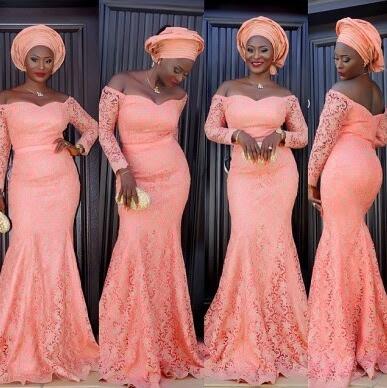 African Coral Bridesmaid Dresses Mermaid Long Vintage Full Lace Formal Evening Gowns Off The Shoudler Long Sleeves Mother of The Bridal
African Coral Bridesmaid Dresses Mermaid Long Vintage Full Lace Formal Evening Gowns Off The Shoudler Long Sleeves Mother of The Bridal