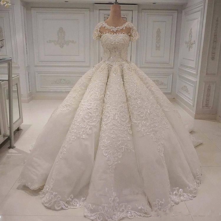 Luxury Ball Gowns Lace Wedding Dresses Cap Sleeves Jewel Neck Formal Bridal Gowns Appliques Sequins Arabic Wedding Dress Robe de marrie