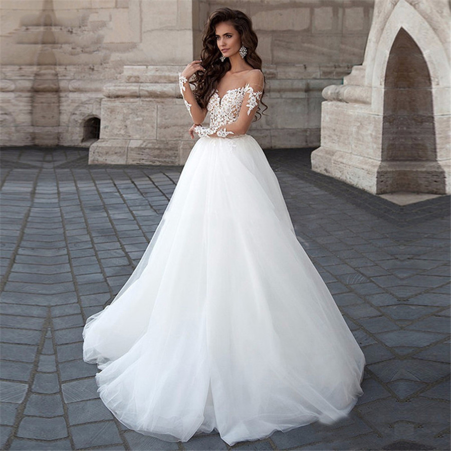 2020 Scoop Long Sleeves Appliques Lace Bride's Wedding Dresses V-Shape Back Backless Sexy Bridal Gowns European Fashion Formal Tulle Lace
2020 Scoop Long Sleeves Appliques Lace Bride's Wedding Dresses V-Shape Back Backless Sexy Bridal Gowns European Fashion Formal Tulle Lace