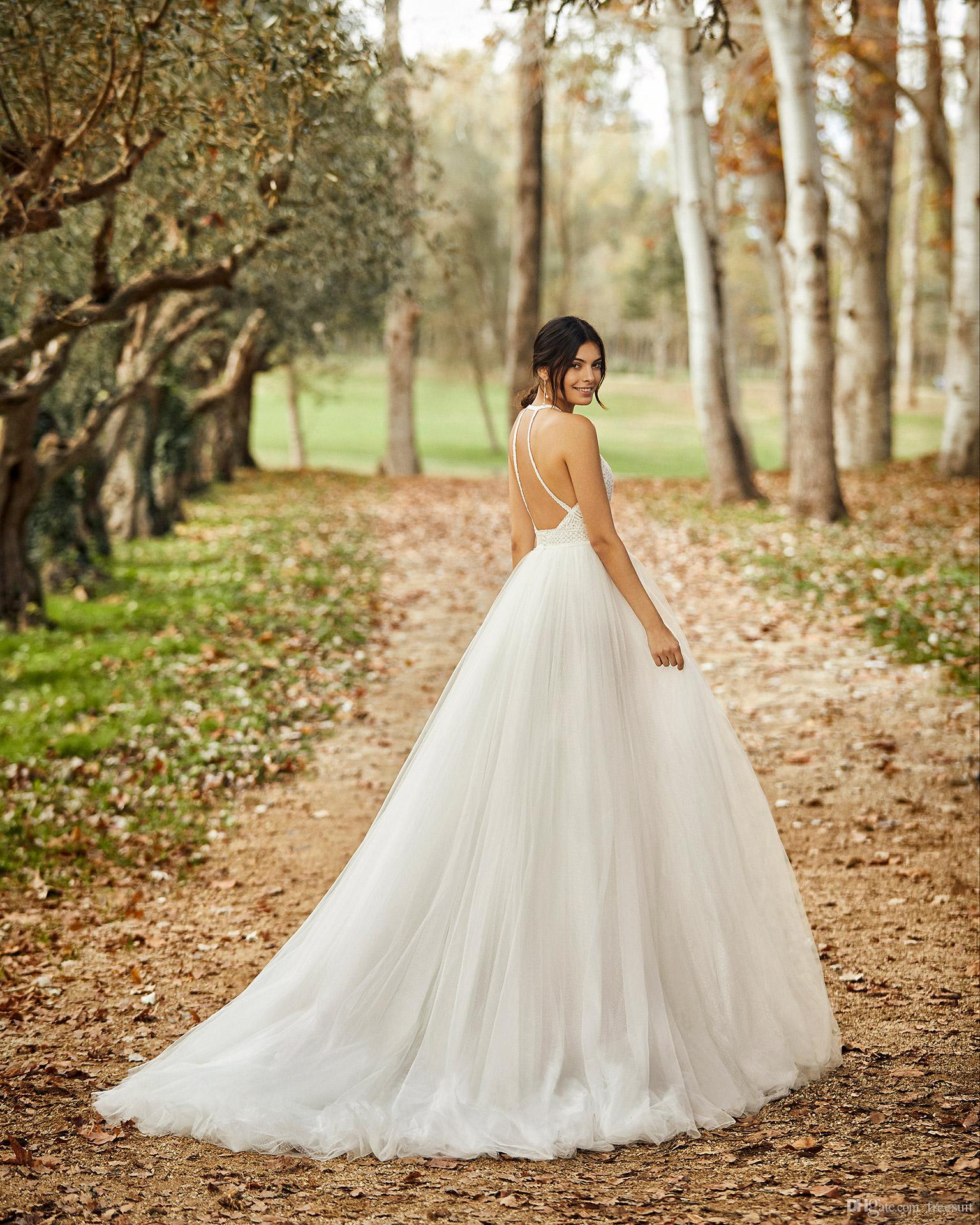 2020 Backless Wedding Dresses Halter Lace Sweep Train Tulle A Line Criss Cross Straps Custom Made Country Wedding Gown vestido de novia