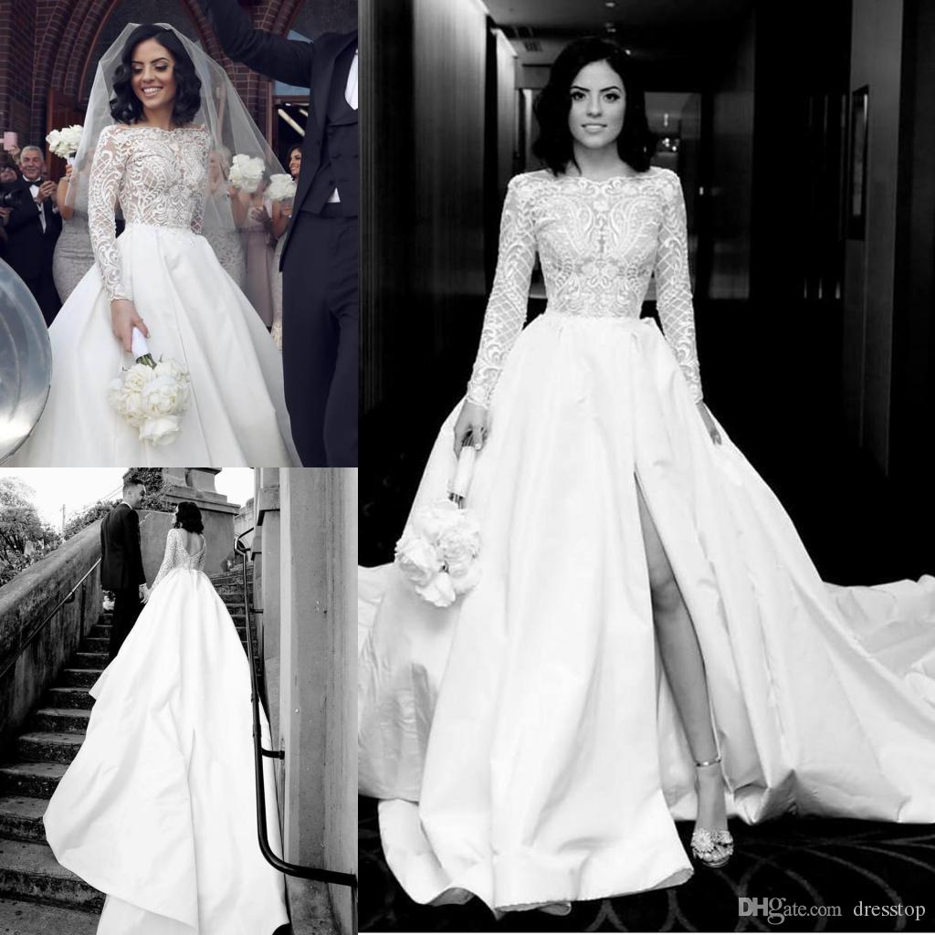 Bohemian 2019 White Wedding Dresses Bateau Neck Long Sleeves Modest Bridal Gowns Front Split Backless Princess Beach Wedding Dress Cheap, Ivory
Bohemian 2019 White Wedding Dresses Bateau Neck Long Sleeves Modest Bridal Gowns Front Split Backless Princess Beach Wedding Dress Cheap, Ivory