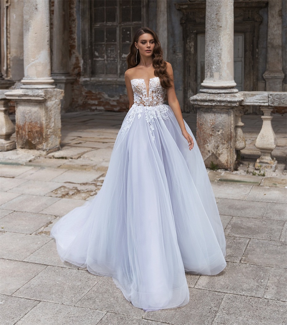 2020 Sexy A Line Wedding Dresses Illusion Bodice Sheer Neck Sleeveless Appliqued Sequins Beaded Court Train Custom Made Bridal Gowns