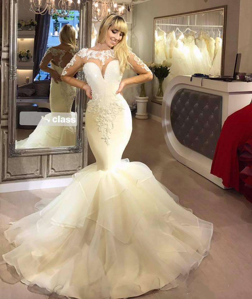 2019 Mermaid Long Sleeve Wedding Dresses Beaded Lace Appliqued Tiered Skirts Wedding Dress Sweep Train Boho Beach Bridal Gowns
