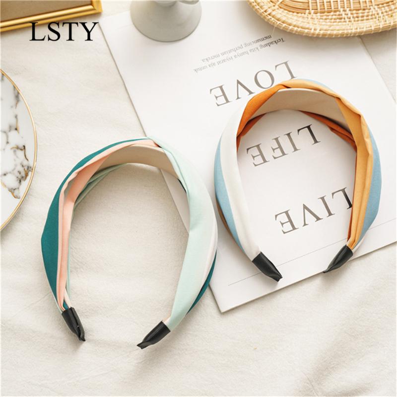 Korean style spring and summer new cross headband hit color fabric wide-brimmed female hair pressure knotted hairband jewelry
Korean style spring and summer new cross headband hit color fabric wide-brimmed female hair pressure knotted hairband jewelry