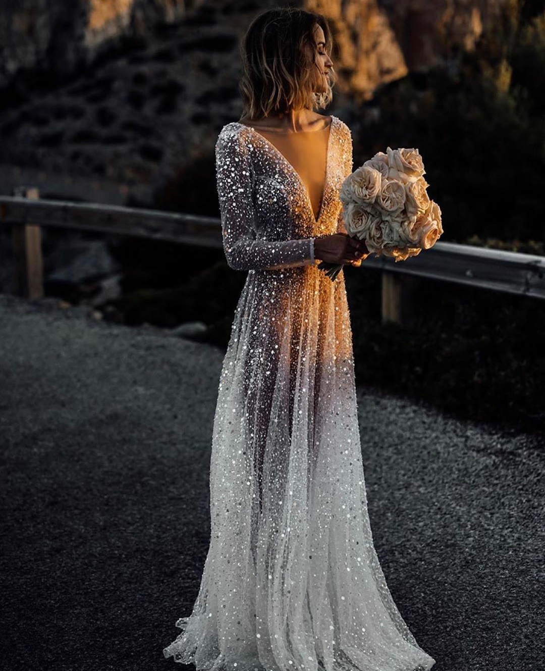 Sexy Transparent Beach Wedding Dresses Long Sleeves 2020 Sequined Backless Robe De Mariee Deep V Neck Bridal Gowns