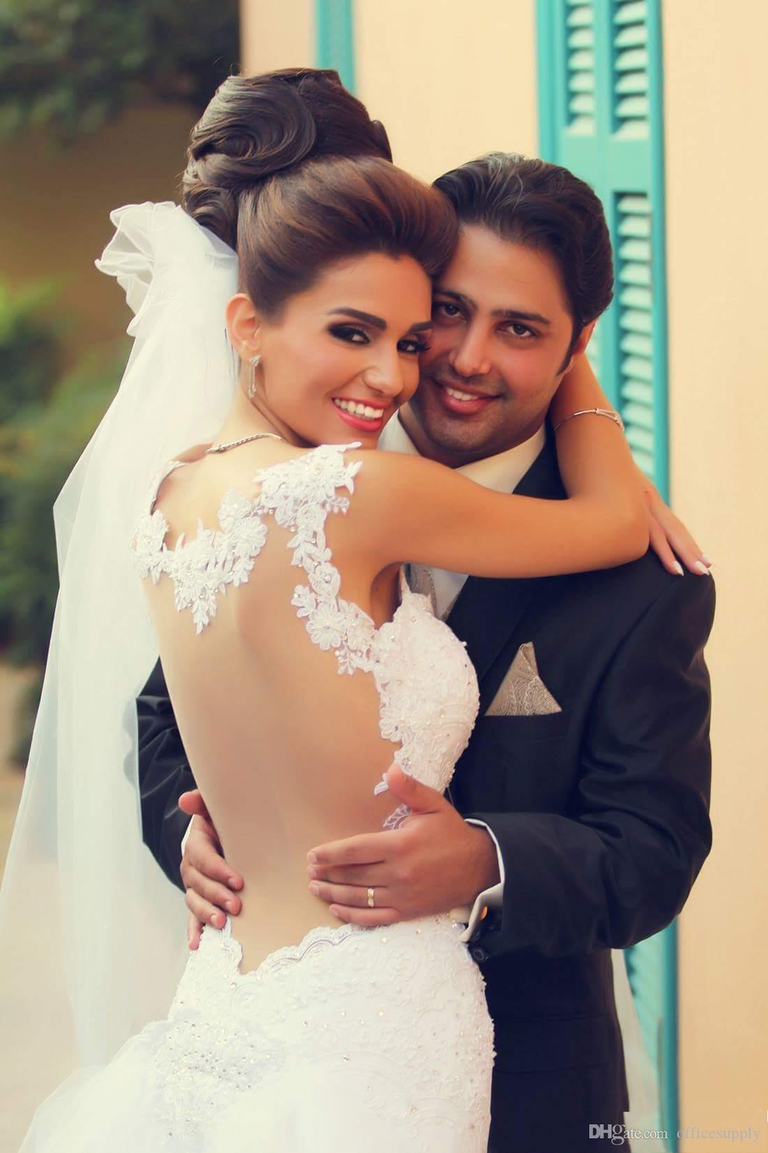 White Arabic Sexy Lace Wedding Dresses New Sweetheart Illusion Back Appliques Beaded Sheer Trumpet Backless Bridal Gowns Vestidos De Novia less