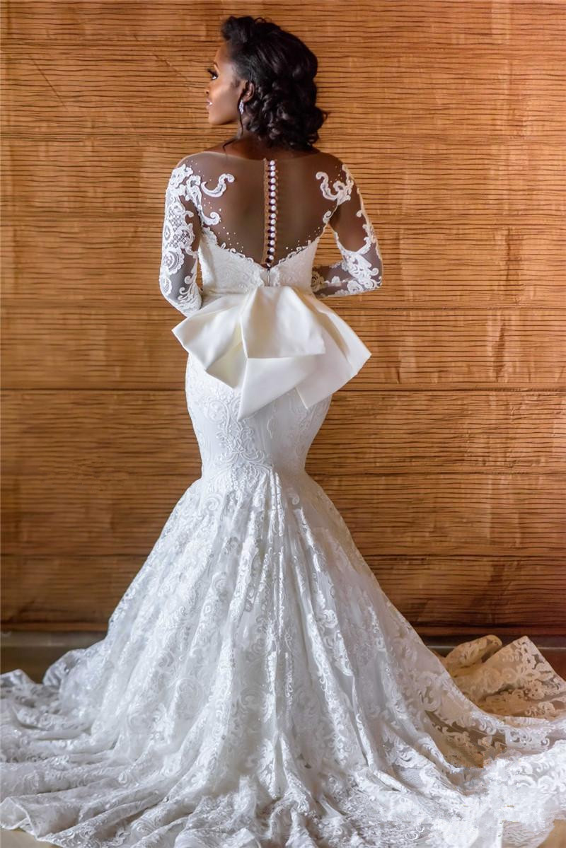Vintage African Mermaid Wedding Dresses with Detachable Train Long Sleeves Buttons Back Beach Wedding Gowns Lace Sequined vestido de novia