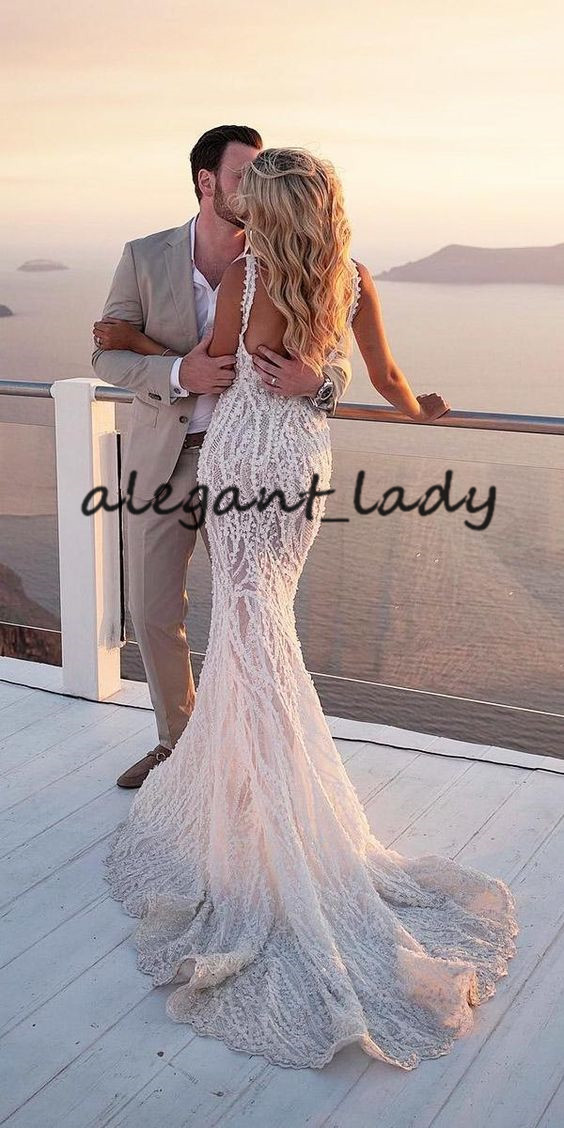 Stunning Lace Applique Beach Wedding Dresses with Dancing Train 2020 Modern Spaghetti Backless Holiday Mermaid Bride Wedding Gown