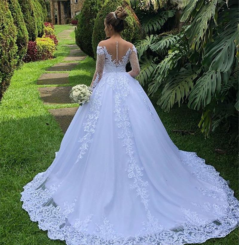Dubai A New Line Wedding Dresses Illusion Neck Lace Appliques Crystal Beaded Tulle Court Train Arabic Plus Size Formal Bridal Gowns Ppliques Rabic