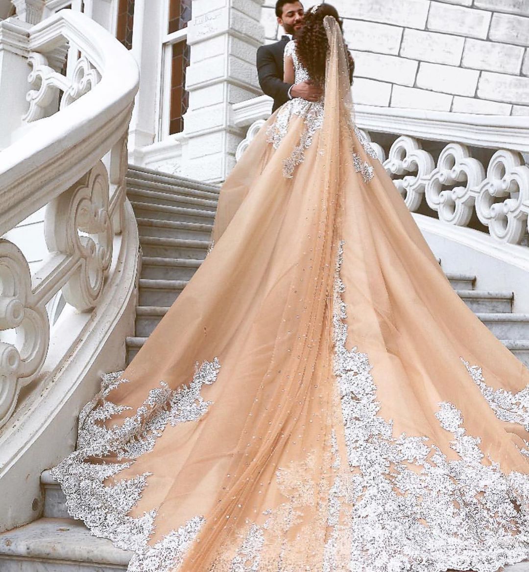 Arabic Champagne Dresses Lace Appliqued Beaded Sheer Jewel Neck Long Sleeve Wedding Dress Sweep Train Vestidos De Novia