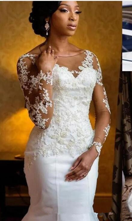 African Mermaid Wedding Dresses with Illusion Long Sleeve 2019 Jewel Neck Lace-up Trumpet Lace Beaded Garden Bridal Dress