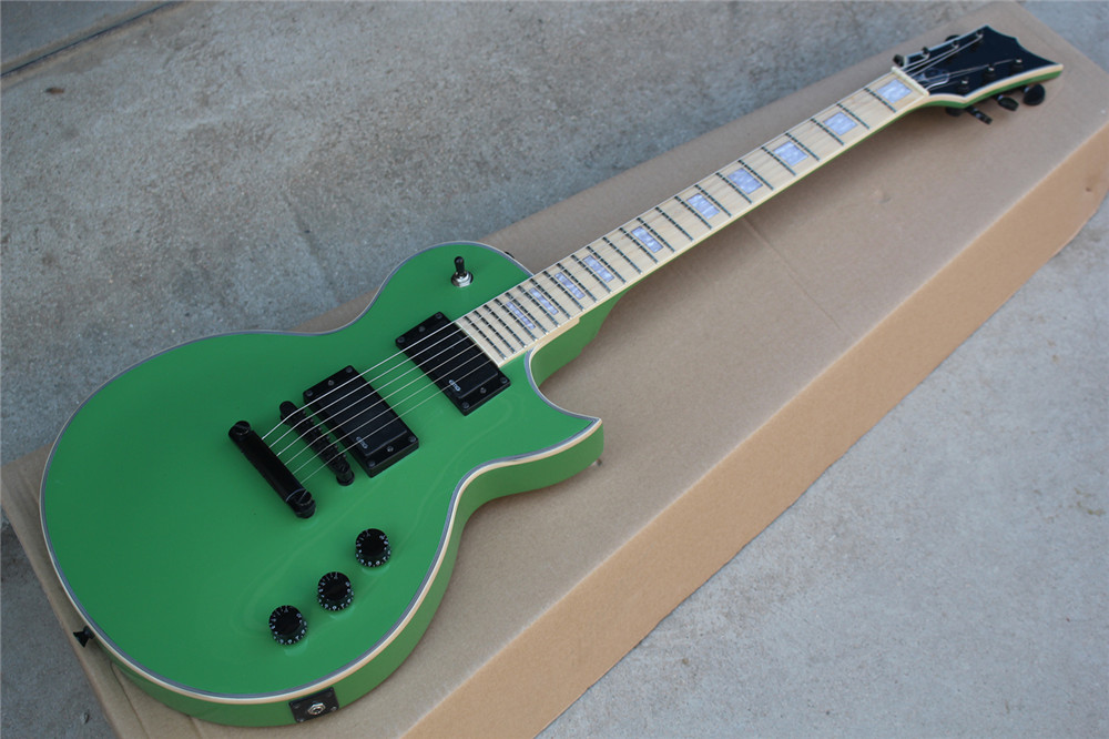 Maple Fingerboard Green Electric Guitar with White Pearl Block Inlay,Black hardware,Body Binding,can be customized
Maple Fingerboard Green Electric Guitar with White Pearl Block Inlay,Black hardware,Body Binding,can be customized