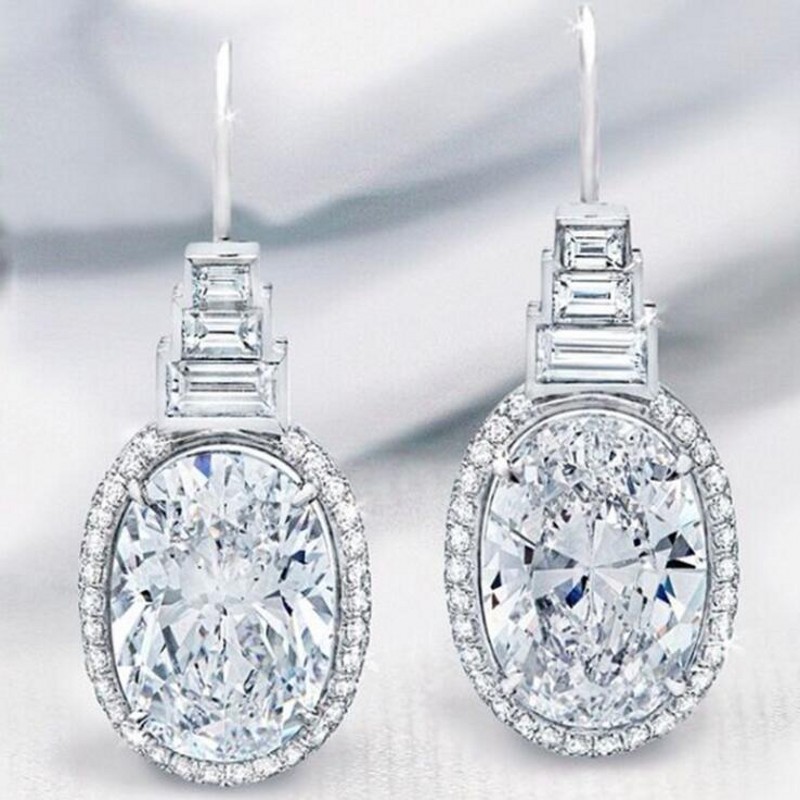 Top-Selg Vintage Jewelry: Oval Cut White Topaz Dangg Earrings in Sterg Sier for Women