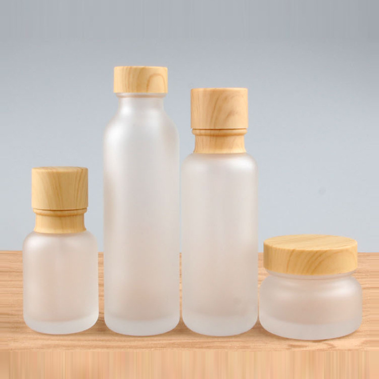 Frosted Glass Jar Cream Bottles Round Cosmetic Jars Hand Face Lotion Pump Bottle with wood grain cap