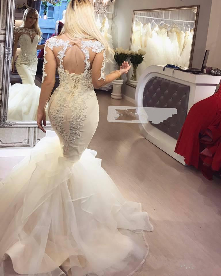 2019 Mermaid Long Sleeve Wedding Dresses Beaded Lace Appliqued Tiered Skirts Wedding Dress Sweep Train Boho Beach Bridal Gowns