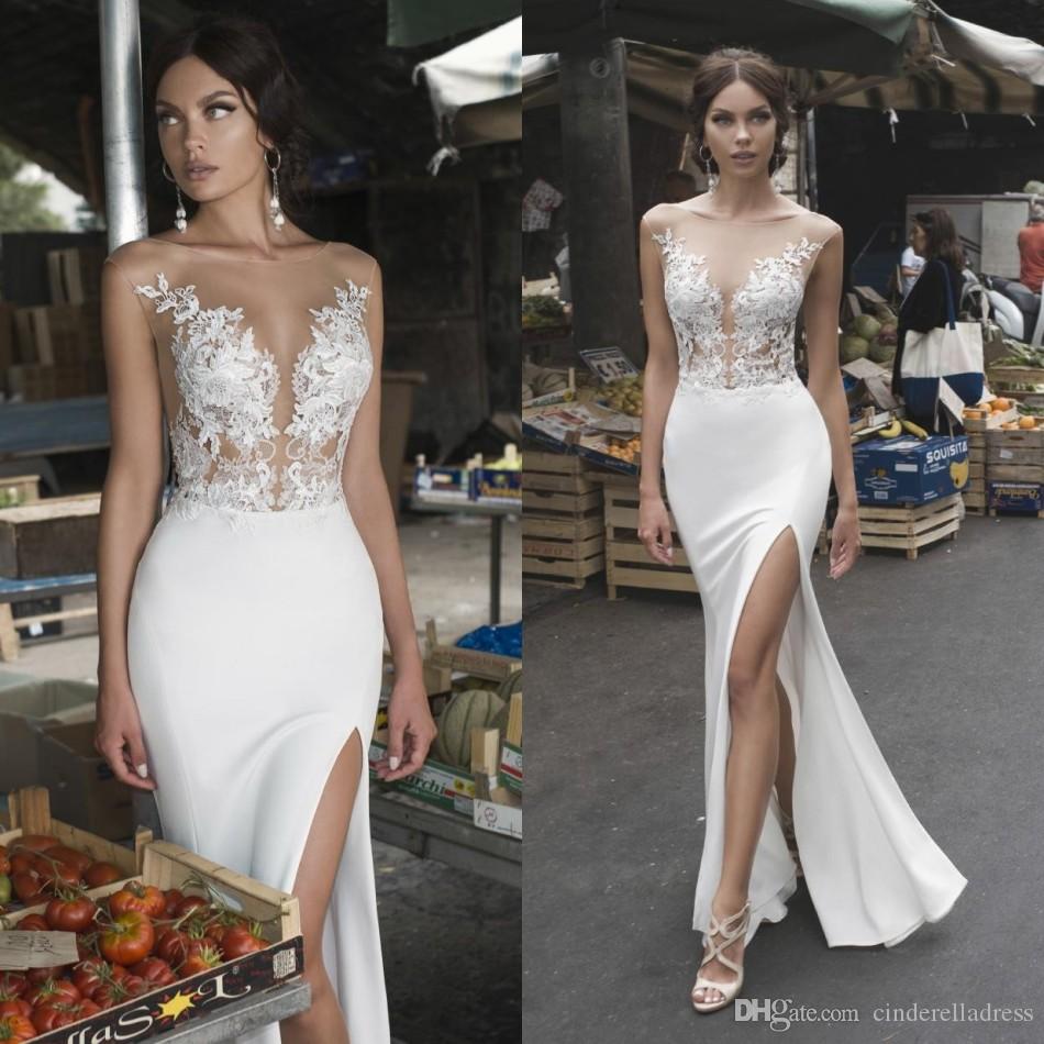 2020 New Sexy Beach Bohemian Illusion Wedding Dresses Chiffon High Side Split Bridal Gowns Appliqued Sheer Jewel Neck Formal Dress, White
2020 New Sexy Beach Bohemian Illusion Wedding Dresses Chiffon High Side Split Bridal Gowns Appliqued Sheer Jewel Neck Formal Dress, White