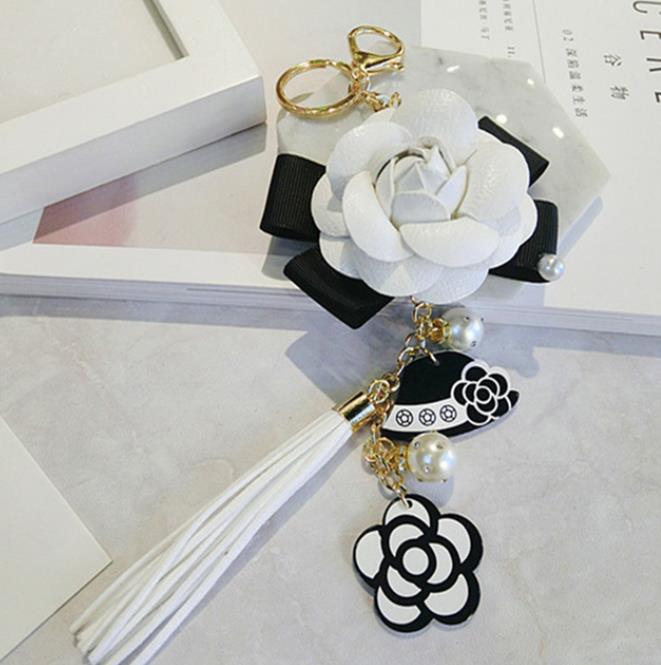 Genuine Leather Black&White Male&Female Keychain Bag Plush Car Key Ring Car Key Camellia Flower Hat Tassel Style Key Chain, Silver
Genuine Leather Black&White Male&Female Keychain Bag Plush Car Key Ring Car Key Camellia Flower Hat Tassel Style Key Chain, Silver