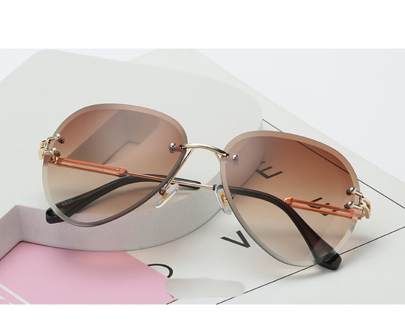 Fashion Polygon Trimmed Sunglasses Woman Retro Travel Beach Metal Rimless Eyeglasses Lady Driving Sports Eyewear 8837
Fashion Polygon Trimmed Sunglasses Woman Retro Travel Beach Metal Rimless Eyeglasses Lady Driving Sports Eyewear 8837