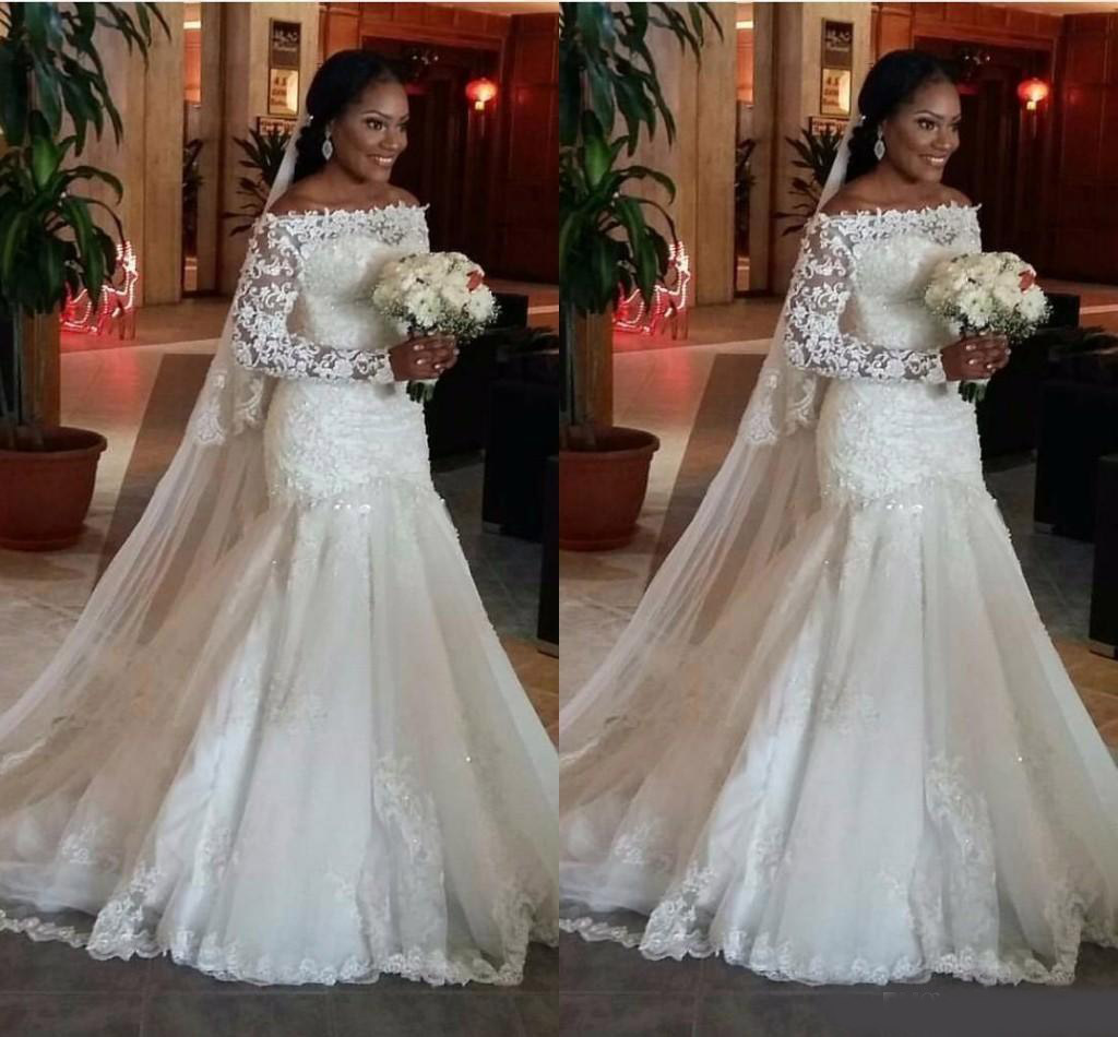 2020 New Cheap Arabic Mermaid Wedding Dresses Off Shoulder Illusion Long Sleeves Beaded Crystal Plus Size Sweep Train Formal Bridal Gowns