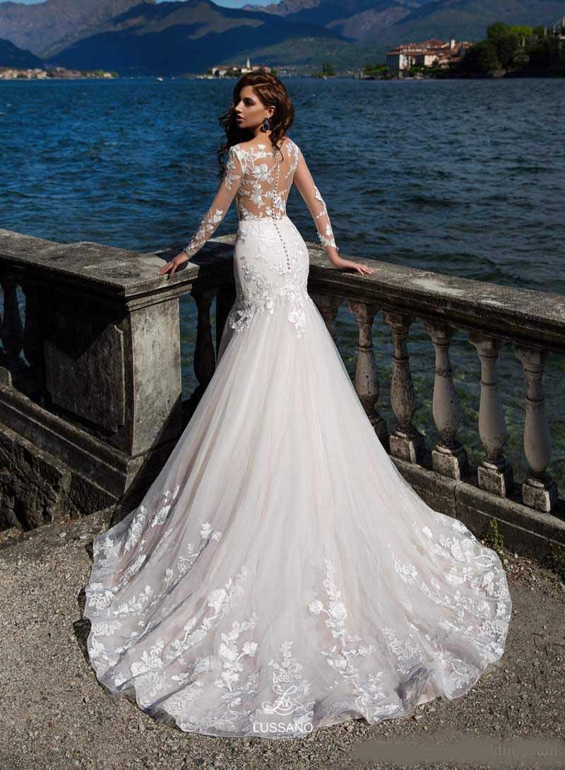 New Arrival Mermaid Lace Wedding Dresses With Long Sleeves Sheer Bateau Neck Bridal Gowns Sweep Train Trumpet Covered Buttons Wedding Dress