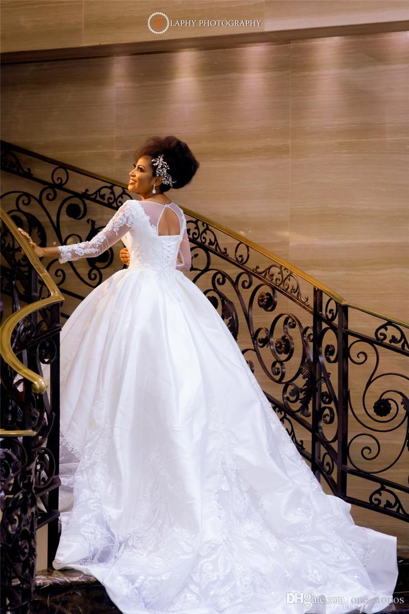 Mondern Dubai Arabic African Plus Size Ball Gown Dresses Beaded Sheer Neck Long Sleeevs Crystals Pearls Wedding Dress Bridal Gowns