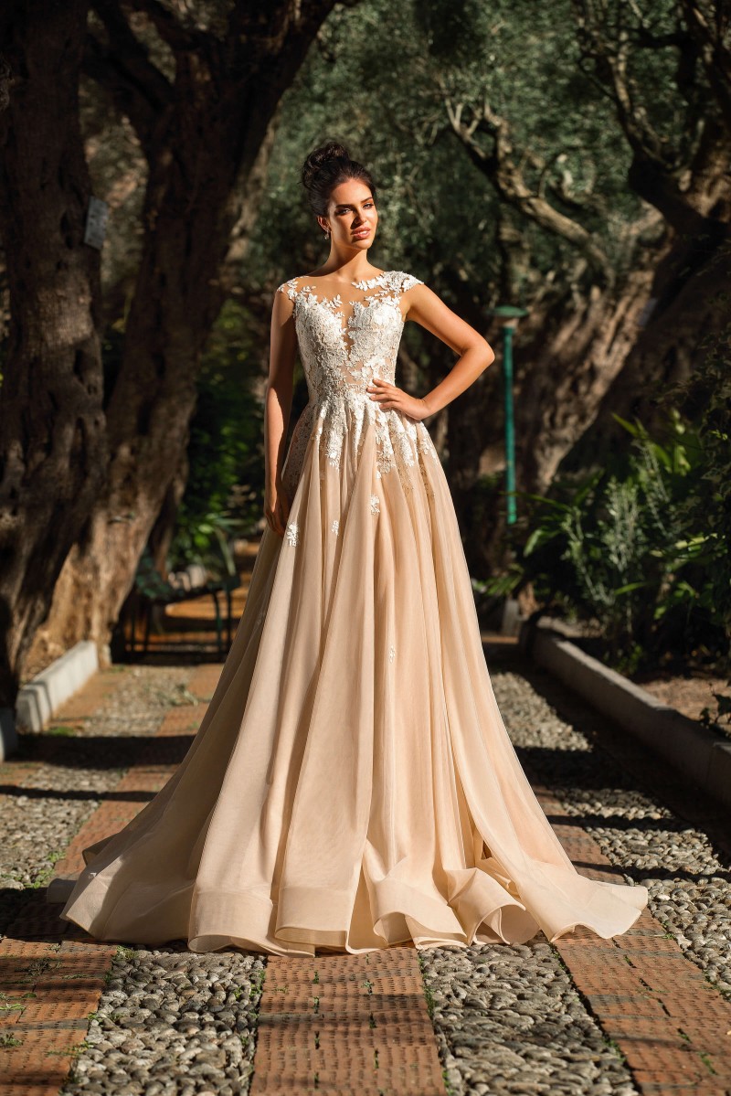Innocentia A Line Wedding Dresses Sheer Baetau Neck Lace Bridal Gowns Sleeveless Illusion Back Boho Wedding Dress Cheap vestido de novia