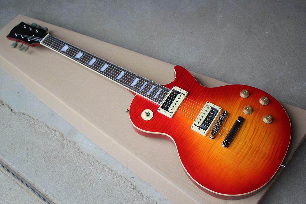 Factory Custom Cherry Sunburst Electric Guitar with Flame Maple Veneer Chrome Hardware Trapezoid Fret Inlay Offer Customized
Factory Custom Cherry Sunburst Electric Guitar with Flame Maple Veneer Chrome Hardware Trapezoid Fret Inlay Offer Customized