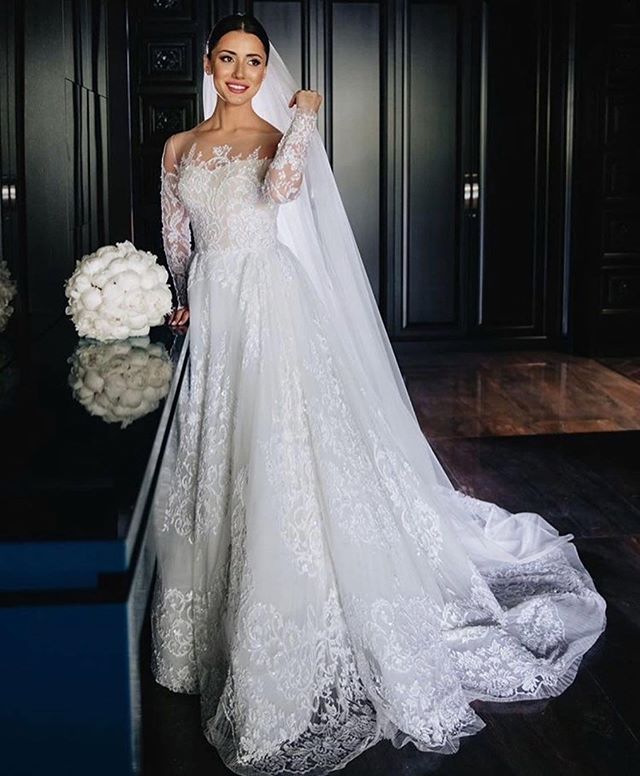 Elegant White Lace Bridal Dresses Sheer Jewel Neck Long Sleeve Wedding Gowns A Line Sweep Train robes de soirée