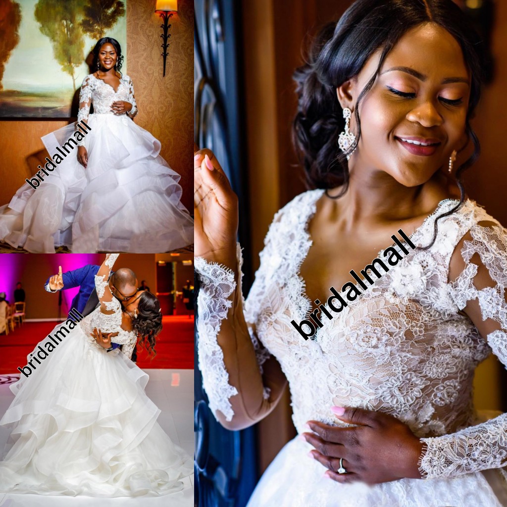 Lace Appliqued Arabic Plus Size Wedding Dresses Deep V Neck Long Sleeves Bridal Dresses Tiered Ruffles African Wedding Gowns Robe de mariée, Red
Lace Appliqued Arabic Plus Size Wedding Dresses Deep V Neck Long Sleeves Bridal Dresses Tiered Ruffles African Wedding Gowns Robe de mariée, Red