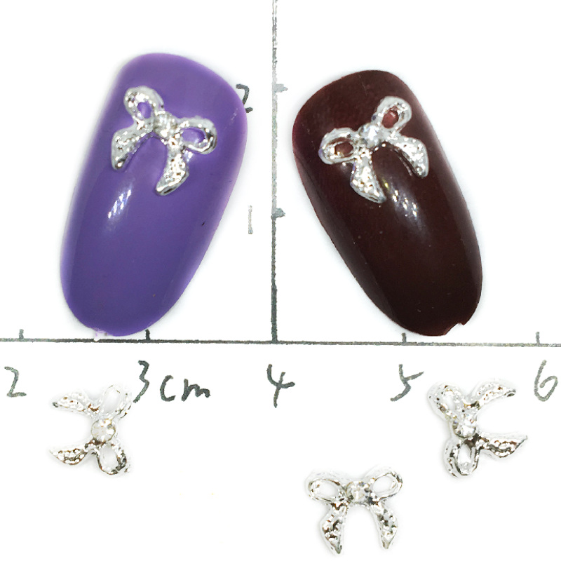 20Pcs Silver 3d Bows Nail Art Decorations with Crystals Charms Metal Nailart Accessoires Rhinestones Supply for Manicure Jewelry 
20Pcs Silver 3d Bows Nail Art Decorations with Crystals Charms Metal Nailart Accessoires Rhinestones Supply for Manicure Jewelry