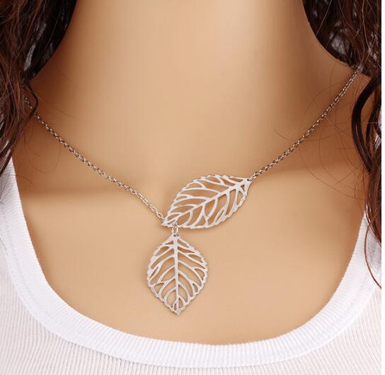 Fashion-Punk Gold Hollow Two Leaf Leaves Pendant Necklace Clavicle Chain Simple European New Fashion Charm Jewelry Women Christmas Gift