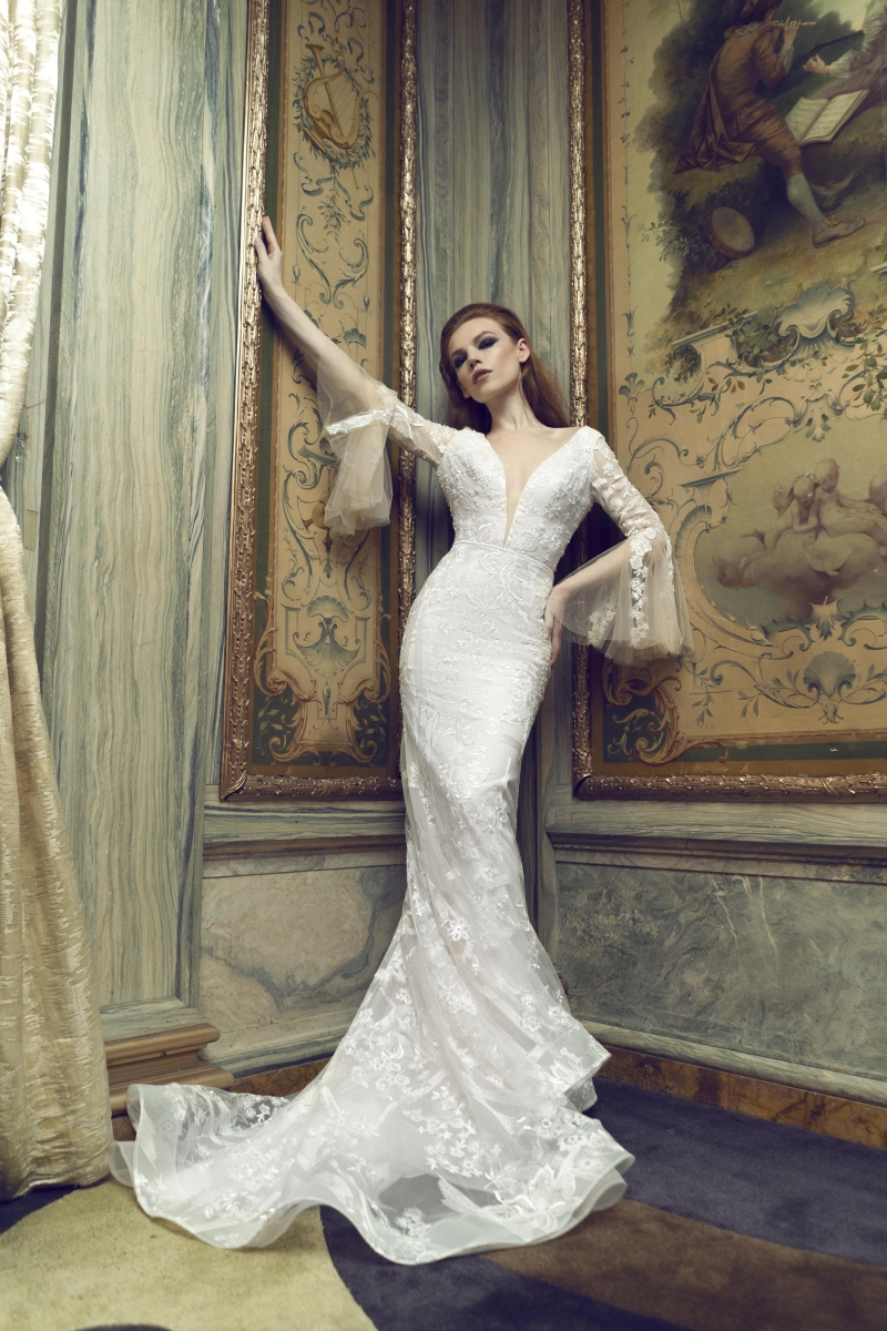 Sexy Mermaid Wedding Dresses Illusion V Neck Long Sleeve Appliqued Lace Bridal Gowns Sweep Train Wedding Dress robes de mariée