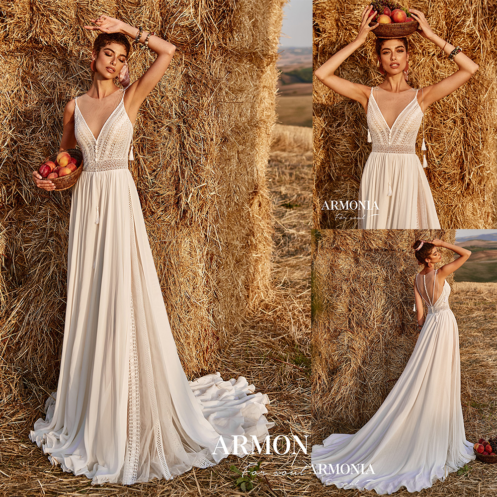 2020 Bohemian Wedding Dresses Sheer Jewel Neck Lace Appliques Backless Boho Wedding Dress A Line Sweep Train Beach Vestidos De Novia