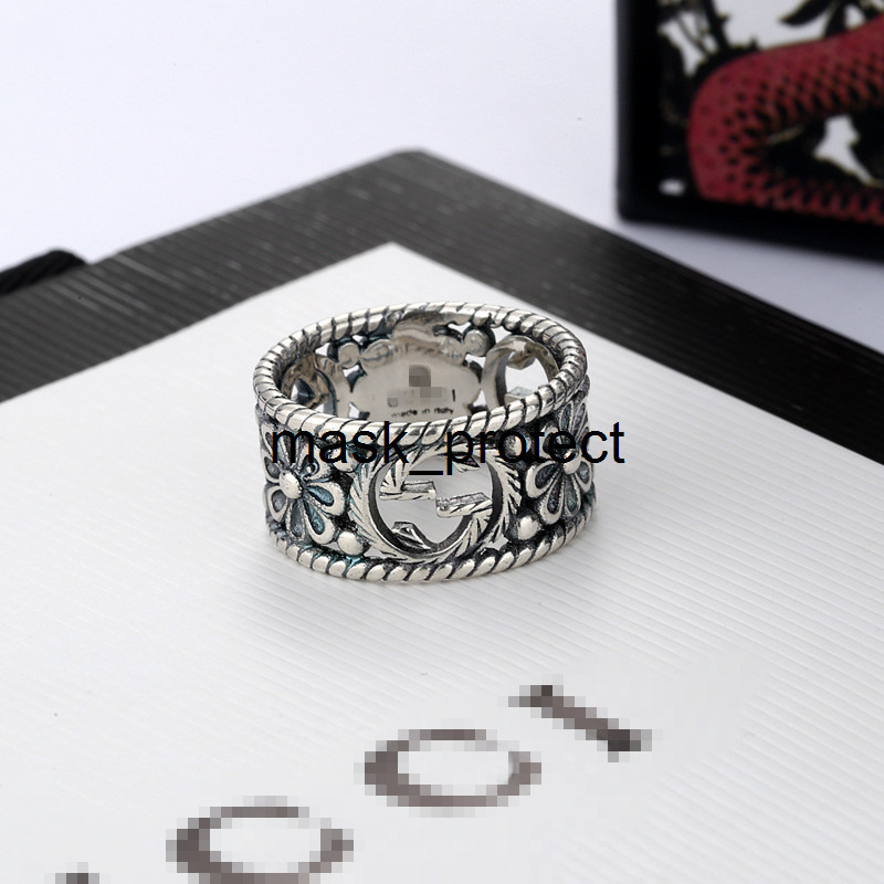 Double G Gujia women's jewelry silver ring simple style Comprehensive small flower carving trend wide
Double G Gujia women's jewelry silver ring simple style Comprehensive small flower carving trend wide
