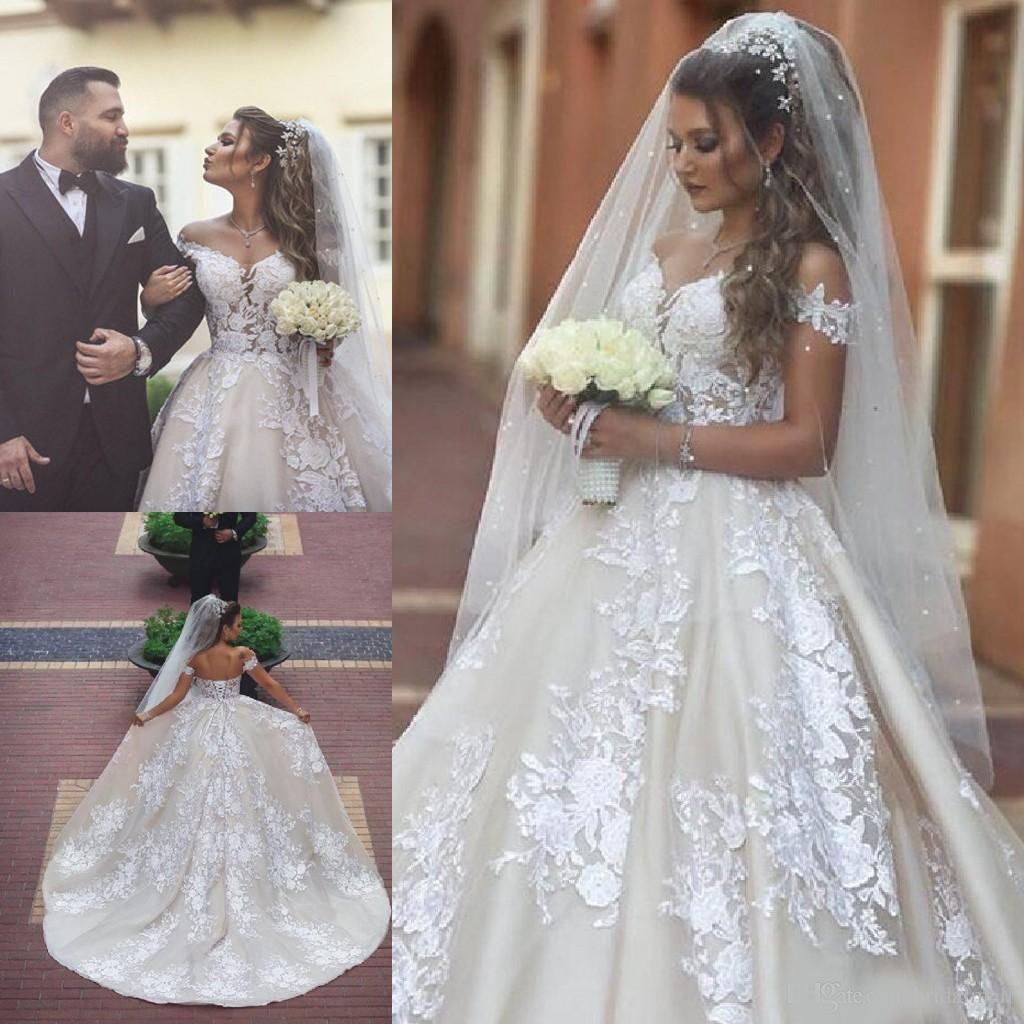 Saudi Arabic 2020 Lace Appliques Ball Gown Wedding Dresses Off The Shoulder A Line African Bridal Gowns Corset Back Plus Size Wedding Dress