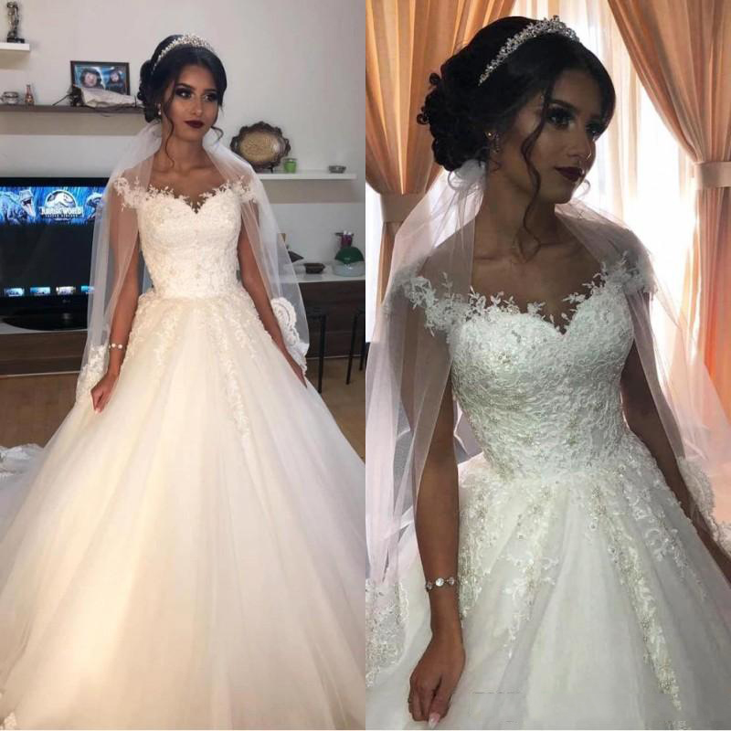 Arabic Off Shoulder Lace Wedding Dresses 2020 with Beaded Appliques Cap Sleeves Tulle Sweep Train A Line Wedding Bridal Gowns, Champagne
Arabic Off Shoulder Lace Wedding Dresses 2020 with Beaded Appliques Cap Sleeves Tulle Sweep Train A Line Wedding Bridal Gowns, Champagne