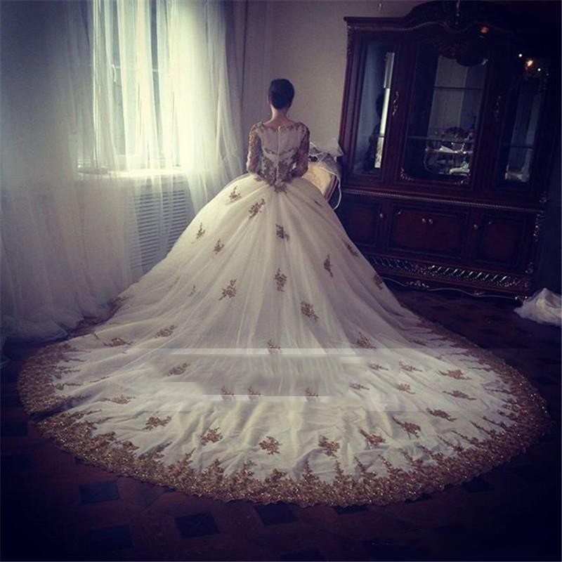 New gold lace gothic ball gown wedding dresses puffy beaded long sleeves bridal gown luxury long train sheer neck china church wedding gowns
