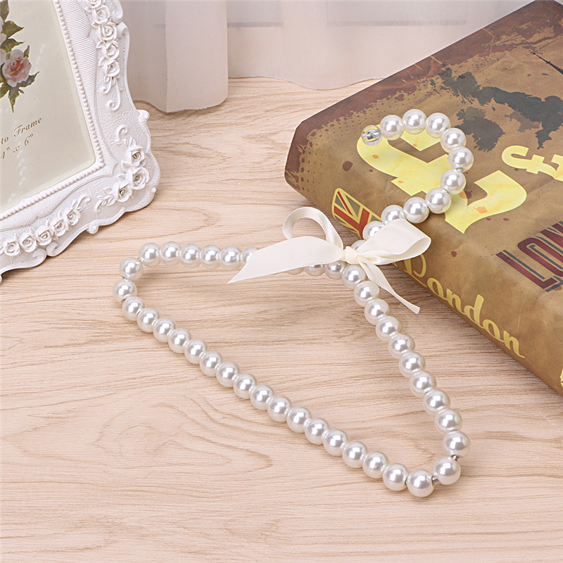 Wholesale 10 PCS Fashion Plastic Pearl Beaded Bow Baby Clothes Hangers Storage Dry Rack Free Shipping
Wholesale 10 PCS Fashion Plastic Pearl Beaded Bow Baby Clothes Hangers Storage Dry Rack Free Shipping