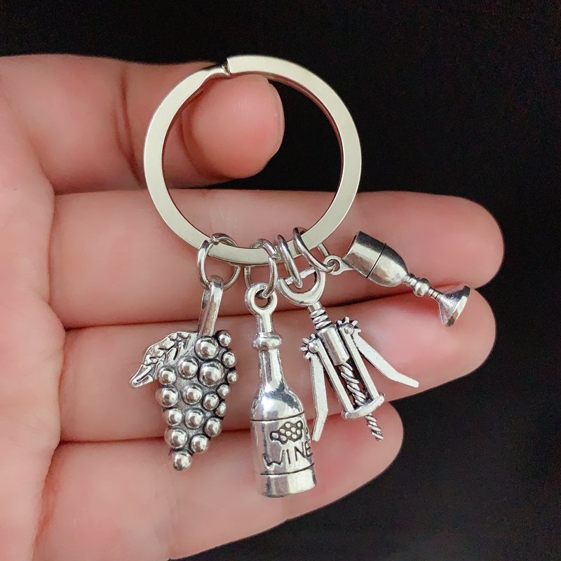 New fashion European and American wine corkscrew wine glass key chain family party bag chain key alloy silver jewelry gift
New fashion European and American wine corkscrew wine glass key chain family party bag chain key alloy silver jewelry gift