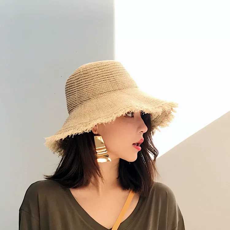 Handknitted solid color sun big hat bristle side breathable straw hat ladies summer sunscreen beach hat foldable2865004