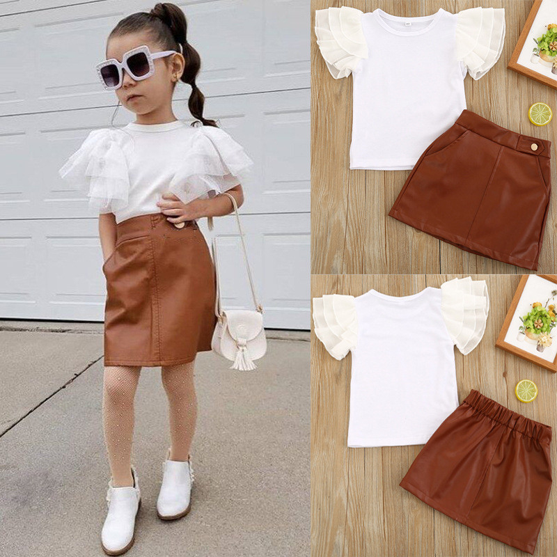 Summer Kids Casual Clothes Sets 2020 Baby Girl Lace Sleeves Tops + Leather Skirt 2Pcs Outfits Toddler Girls Sport Clothing Suit, Niu883
Summer Kids Casual Clothes Sets 2020 Baby Girl Lace Sleeves Tops + Leather Skirt 2Pcs Outfits Toddler Girls Sport Clothing Suit, Niu883