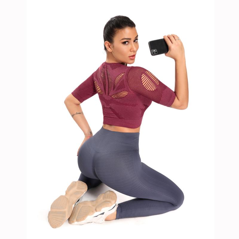 Summer hollowed out navel short-sleeved women' running fitness clothes breathable sportswear American yoga clothes yoga T-shirt
Summer hollowed out navel short-sleeved women' running fitness clothes breathable sportswear American yoga clothes yoga T-shirt