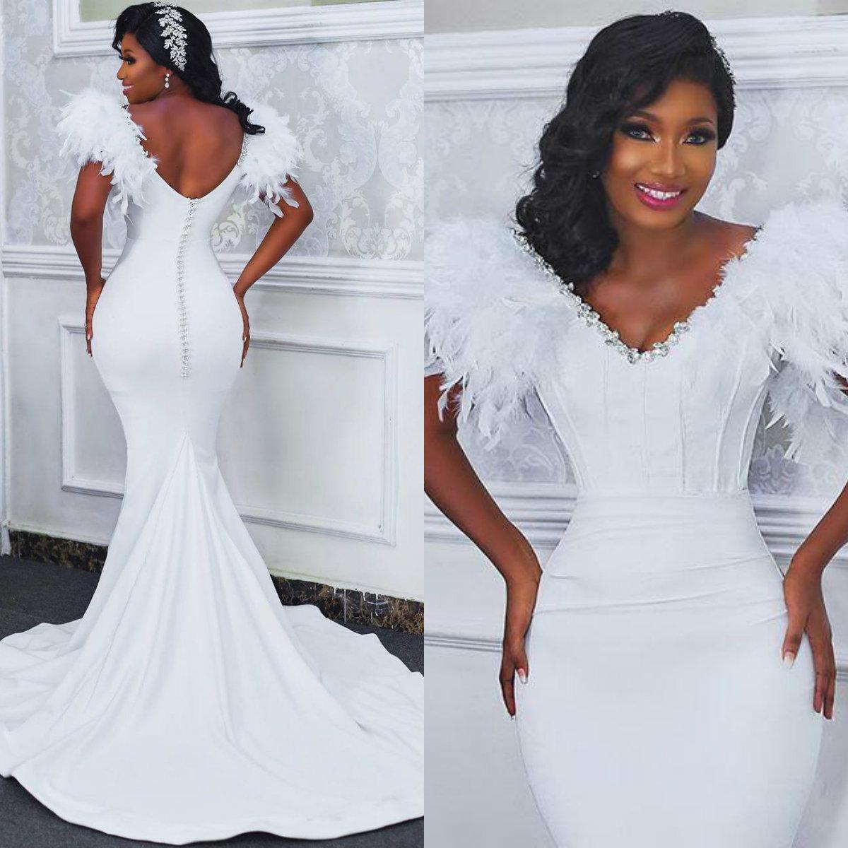 Sexy V Neck Mermaid Wedding Dresses With FeatherCrystals Backless Bridal Gowns Elegant Satin African robes de mariée Modest, White
Sexy V Neck Mermaid Wedding Dresses With FeatherCrystals Backless Bridal Gowns Elegant Satin African robes de mariée Modest, White
